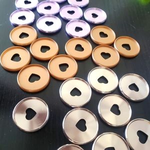 Three sets of the Happy Planner Heart Discs